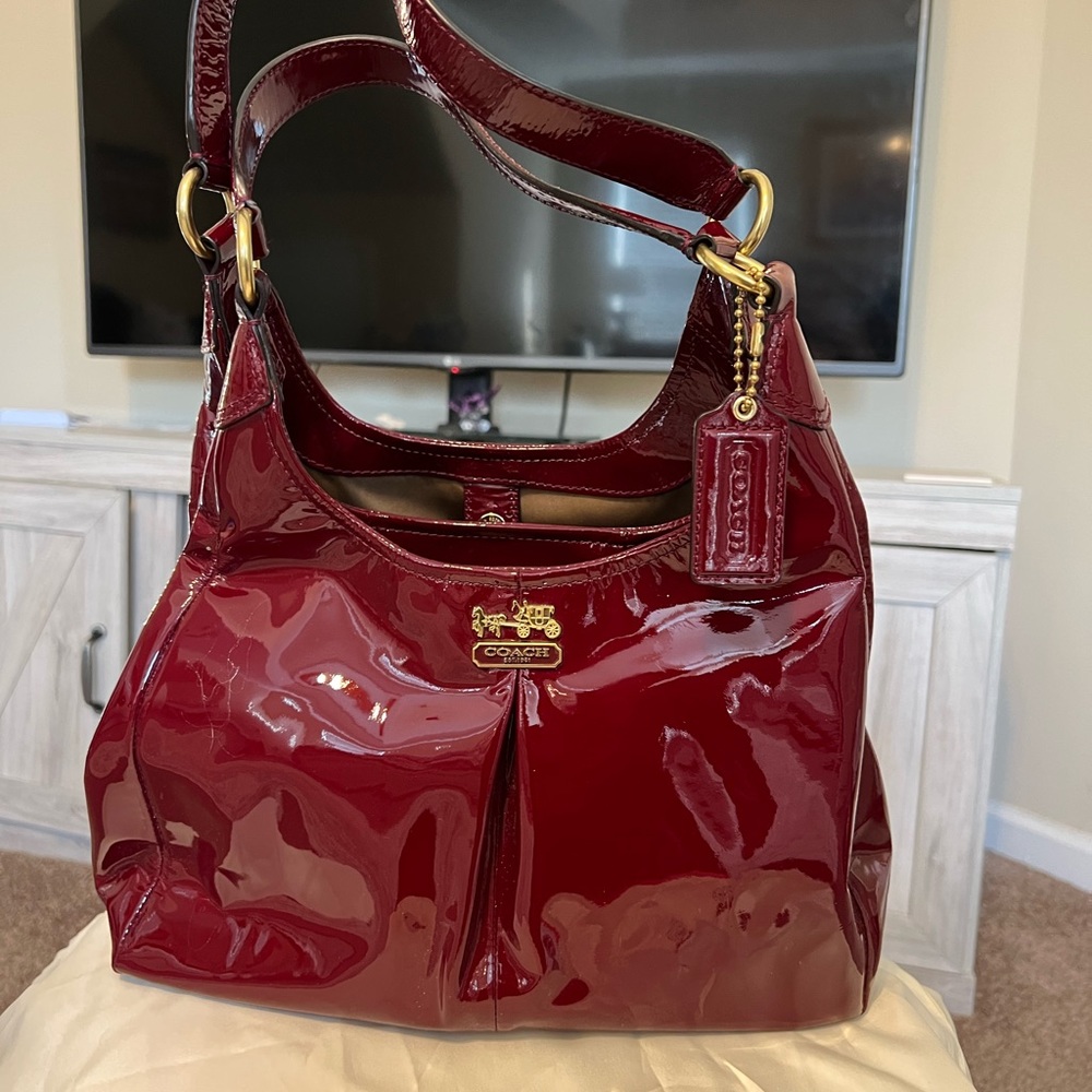 Brand new patent leather Coach Bag.